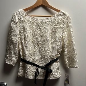 Brand new with tags Beige Lace plus sequined blouse top. Medium size , womens .